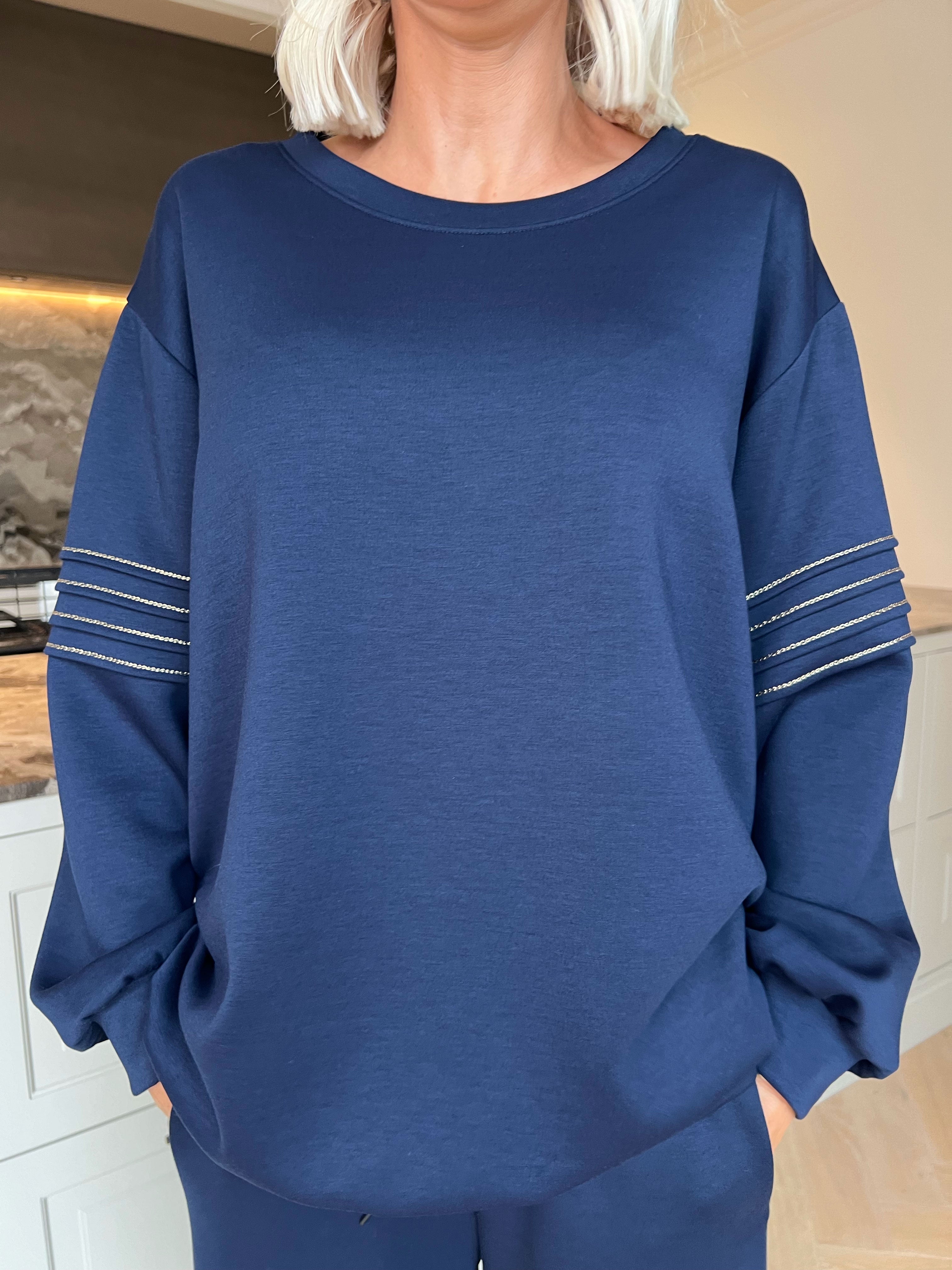 Dream – Mjukt plus size träningsoverallset i viskos med eleganta gulddetaljer